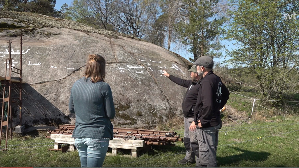 Arkeologerna Tommy Andersson och Andreas Toreld i SVT:s nyhetsinslag.